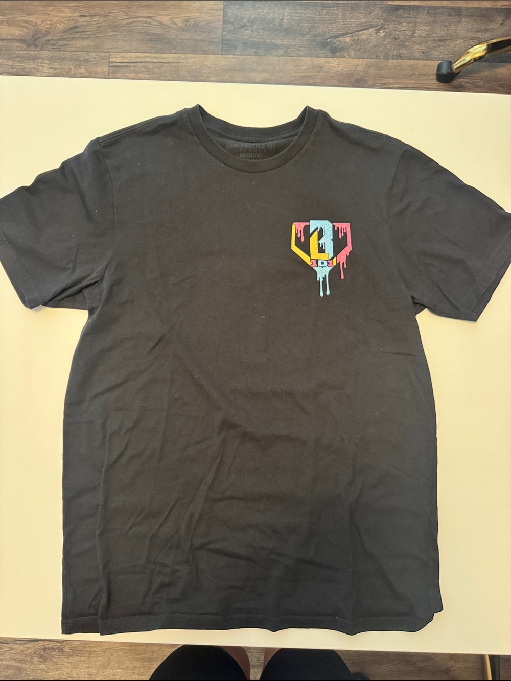 Men's Black Short-Sleeve Tee with Color-Drip Chest Emblem